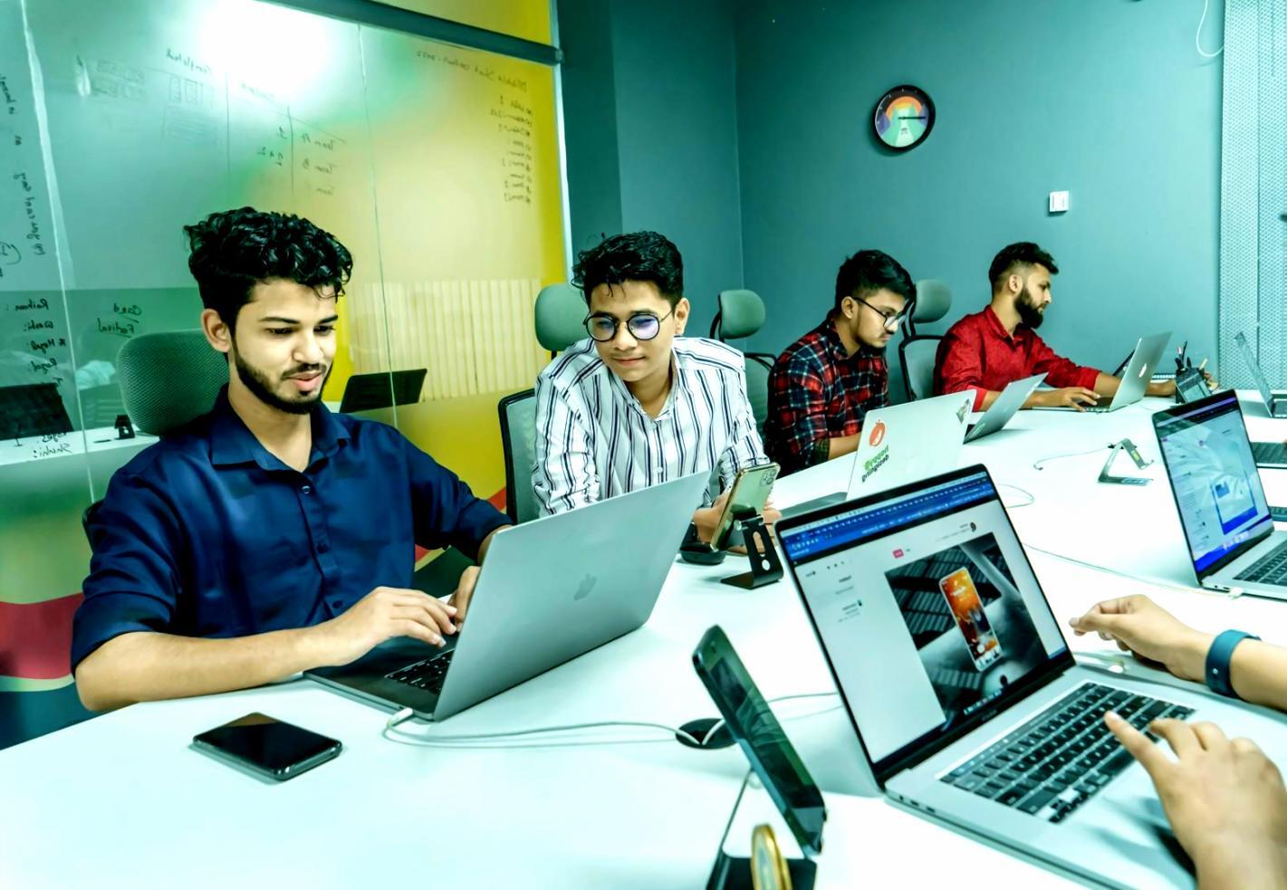 Professional analyzing financial documents with calculator and charts